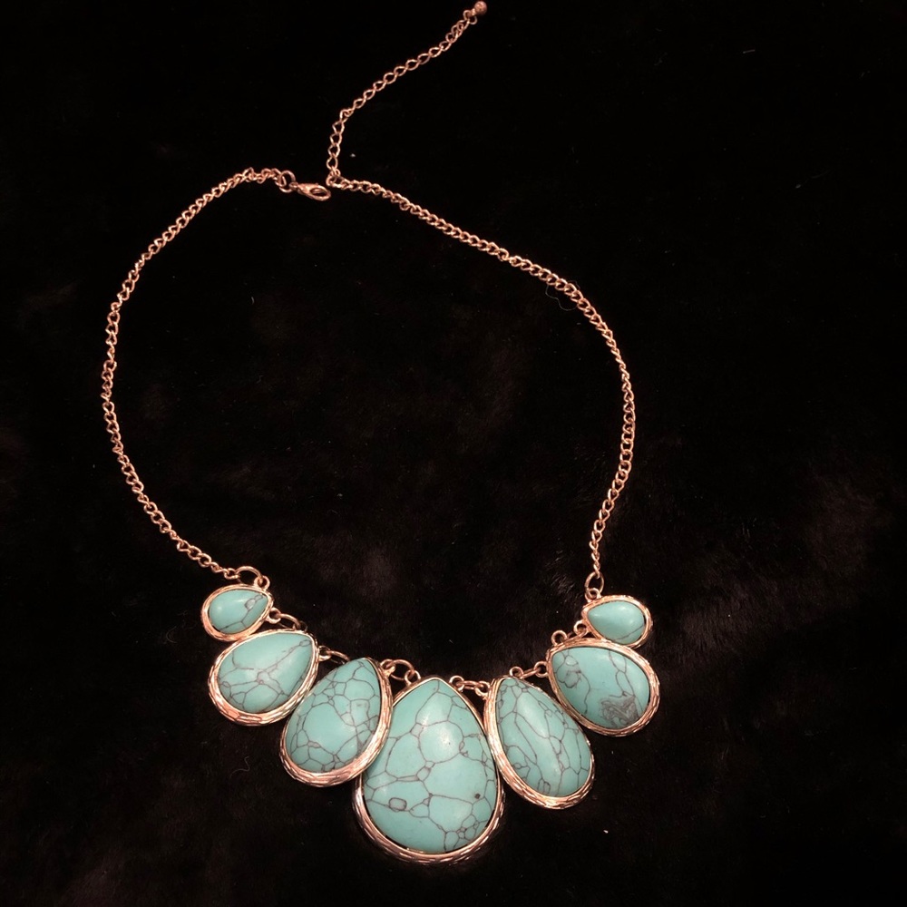 Gold necklace with turquoise beads